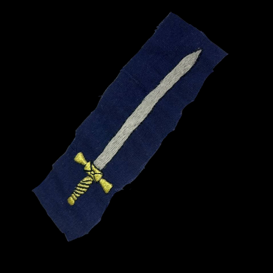 Distintivo de tela de la Centuria Jurídica de la Falange.
